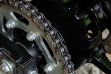 Fototapeta na wymiar rear chain and sprocket of motorcycle wheel