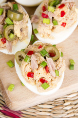 stuffed eggs with tuna, olives and paprica