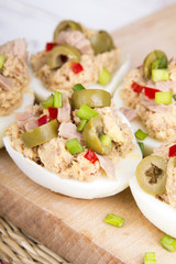 stuffed eggs with tuna, olives and paprica