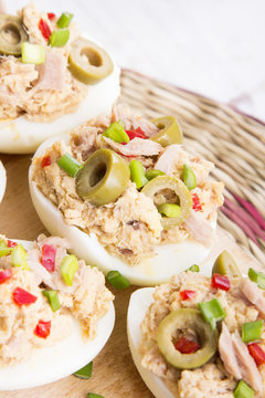 stuffed eggs with tuna, olives and paprica