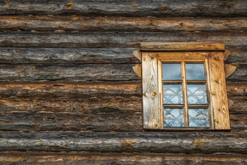 Obraz na płótnie Canvas A wooden wall with window