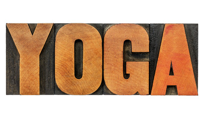 yoga word in wood type