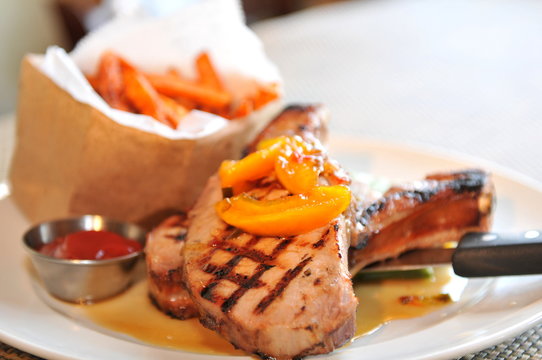 Smoked Grilled Pork Chops With Peaches And Sweet Potato Fries