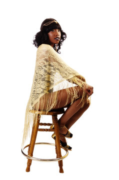 Skinny African American Woman Sitting Gold Shawl