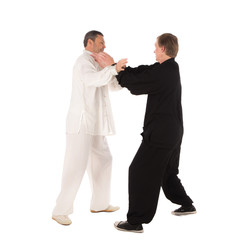 Two karate fighters. Training fight.