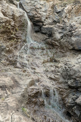 Closeup of polluted waterfall. 