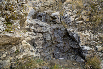 Closeup of polluted waterfall.