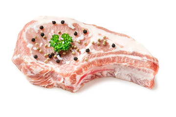 Pork chop with pepper sea salt and parsley
