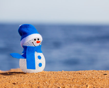 Snowman on sand