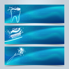 Dental banners or website header set. Tooth,  toothbrush and toothpaste with star glow effect on blue green background