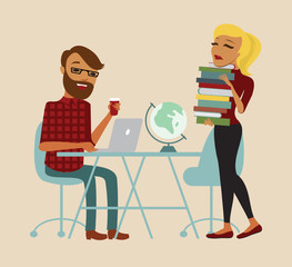 Students sitting at a table while learning and working on a laptop with books