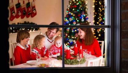 Family at Christmas dinner at home