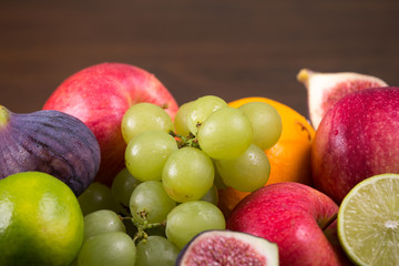 Assortment fruits on wooden table