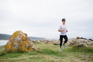 Man running in the coast