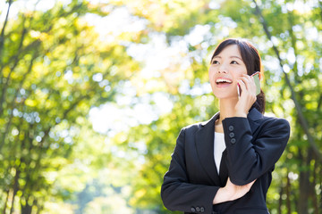 asian businesswoman in the park