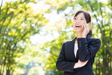 asian businesswoman in the park