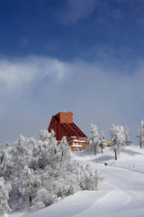 mountain public house on frozen hill