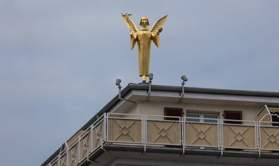 golden angel statue in giessen germany