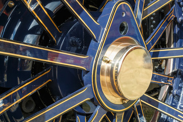 Blue traction engine wheel with brass hub