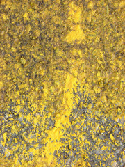 yellow paint splatters on asphalt background design