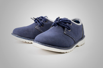 Spotted baby sneakers closeup