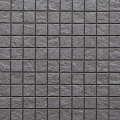 Black stone tile wall texture and background