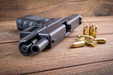Obraz premium Gun with bullets