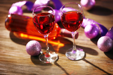 Wine and Christmas decoration on bright background