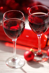 Wine and Christmas decoration on wooden table