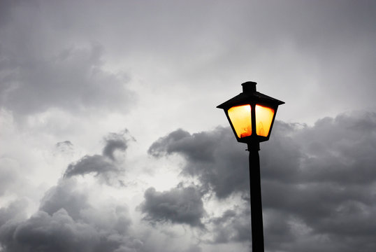 street lamp against dark sky