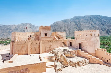 Fotobehang Vestingwerk Nakhal Fort in the Al Batinah Region of Oman. It is located about 120 km to the west of Muscat, the capital of Oman and is known as Qal'a Nakhal or Husn Al Heem.