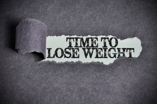 time to lose weight word under torn black sugar paper