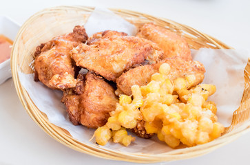 Chicken wing and corn fried in basket,Thai food style