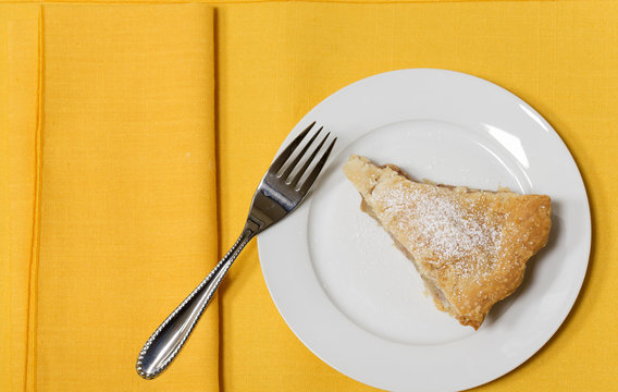 Slice of Apple Pie on a white plate