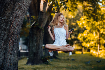 girl levitates in nature