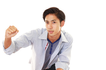 ガッツポーズの青年