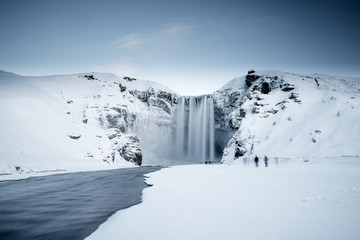 Skogafoss waterfall in Iceland during winter - obrazy, fototapety, plakaty