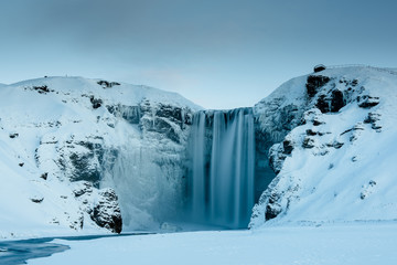 Skogafoss waterfall in Iceland during winter - obrazy, fototapety, plakaty
