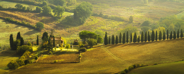 farmhouse in the Tuscan hills of the beautiful autumn morning
