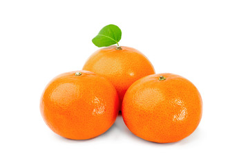 Three ripe tangerines isolated