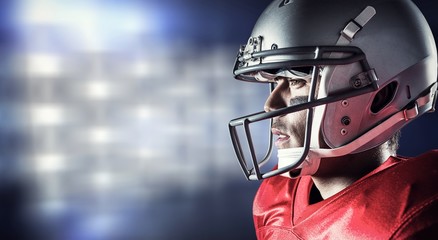 Composite image of side view of sportsman wearing helmet