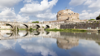 Fototapeta na wymiar Bridge and Castle Sant Angelo with reflection in the water in Ro