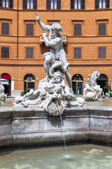 Statue of the Neptune Fountain in Piazza Navona in Rome