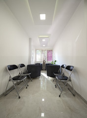 Modern waiting room in dental clinic-seamless panorama made with tilt-shift lens