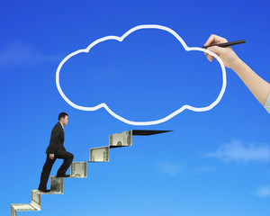 Businessman climbing money stairs toward white cloud shape hand