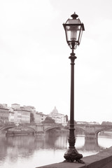 Lamppost and Ponte Santa Trinita Bridge with Arno River; Florenc