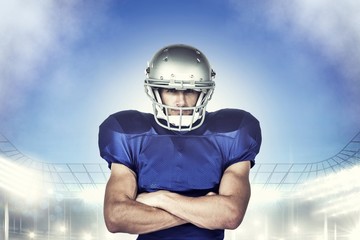 American football player with arms crossed