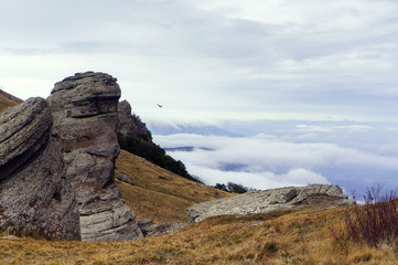 Dark Ghost valley Crimea, rocks and fog in fall season