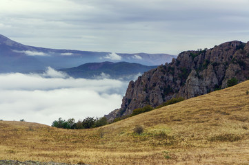 Dark Ghost valley Crimea, rocks and fog in fall season