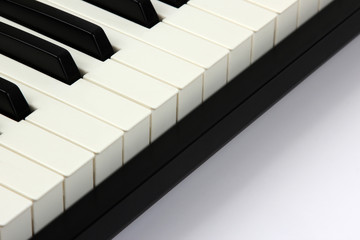 piano keys closeup on white background
